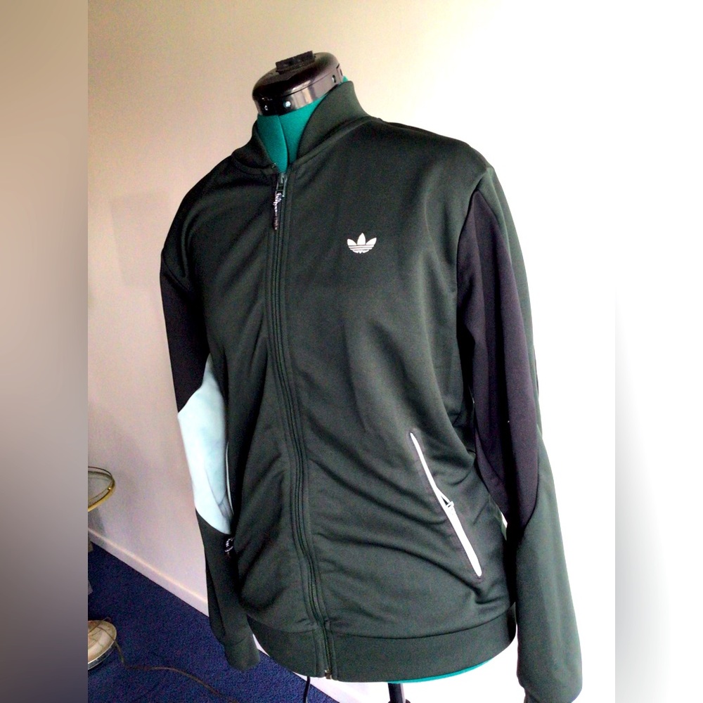 Hunter green. Black and mint green track suit